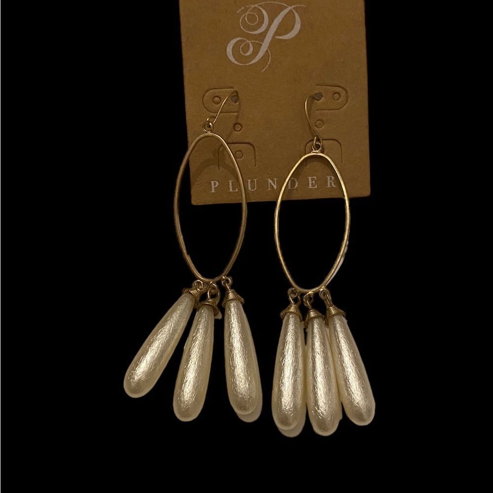Gold earrings with white wood